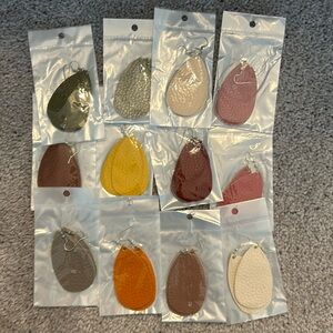 Still in original packaging!! Different color and style earrings.